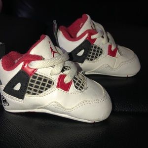 red and black infant jordans